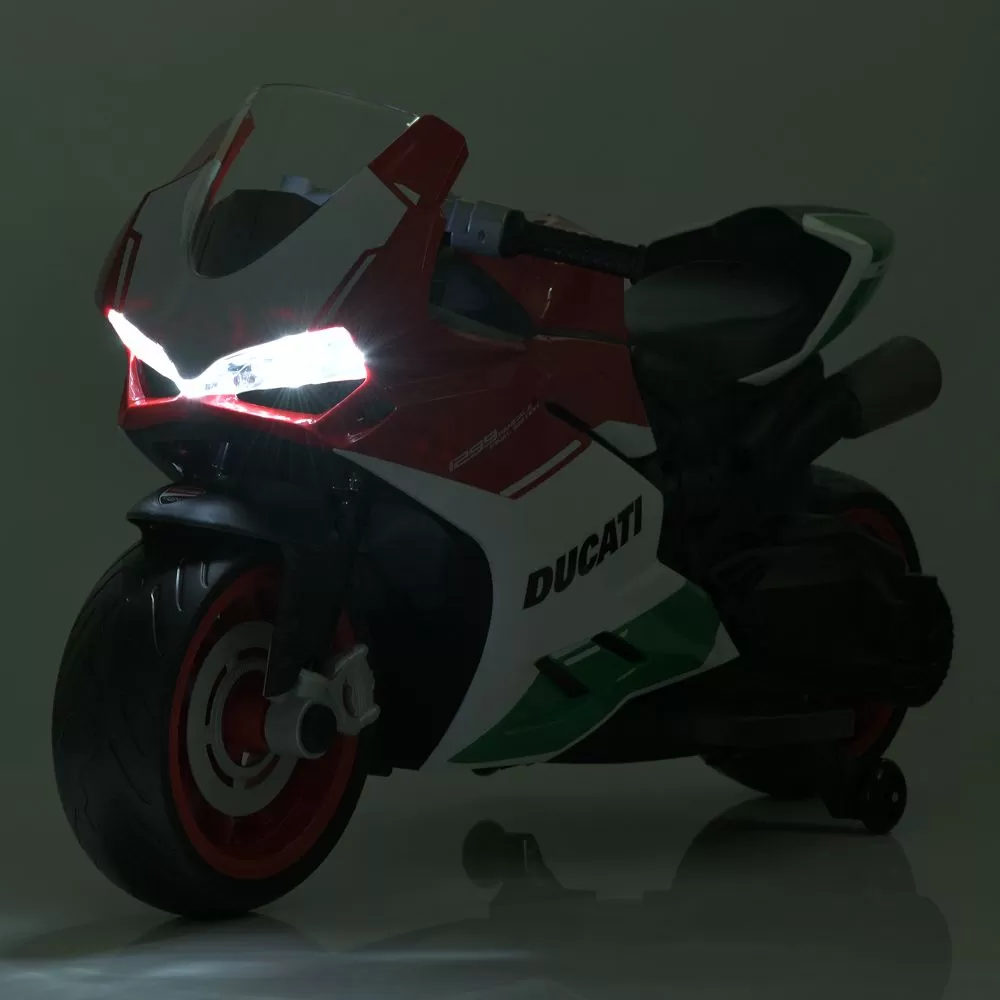 Детский двухколёсный мотоцикл Ducati, с включенными передними фарами