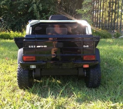 Картинка товару Дитячий шестиколісний електромобіль Mercedes G63 AMG PA.G63.CZ: 6х6, 140W, 8 км/год, EVA колеса, шкіра - ЧОРНИЙ на Raspashonka.ua фото 4 Картинка товару Дитячий шестиколісний електромобіль Mercedes G63 AMG PA.G63.CZ: 6х6, 140W, 8 км/год, EVA колеса, шкіра - ЧОРНИЙ на Raspashonka.ua фото 4