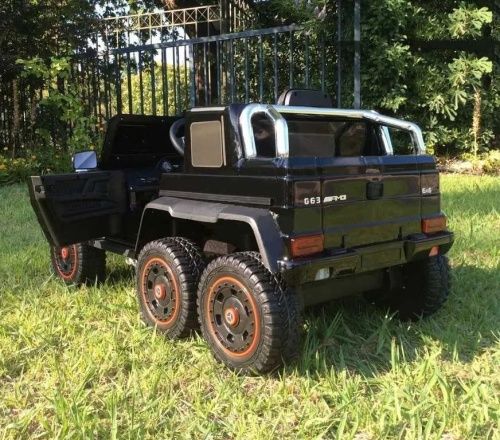 Картинка товару Дитячий шестиколісний електромобіль Mercedes G63 AMG PA.G63.CZ: 6х6, 140W, 8 км/год, EVA колеса, шкіра - ЧОРНИЙ на Raspashonka.ua фото 5 Картинка товару Дитячий шестиколісний електромобіль Mercedes G63 AMG PA.G63.CZ: 6х6, 140W, 8 км/год, EVA колеса, шкіра - ЧОРНИЙ на Raspashonka.ua фото 5